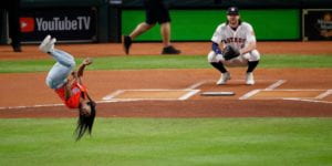 Simone Biles flipping before throwing out first pitch in GAME 2 of 2019 World Series.