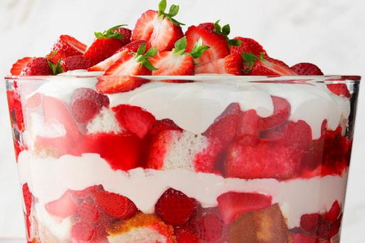 strawberry angel dessert with layers of cake, strawberries, and whipped cream