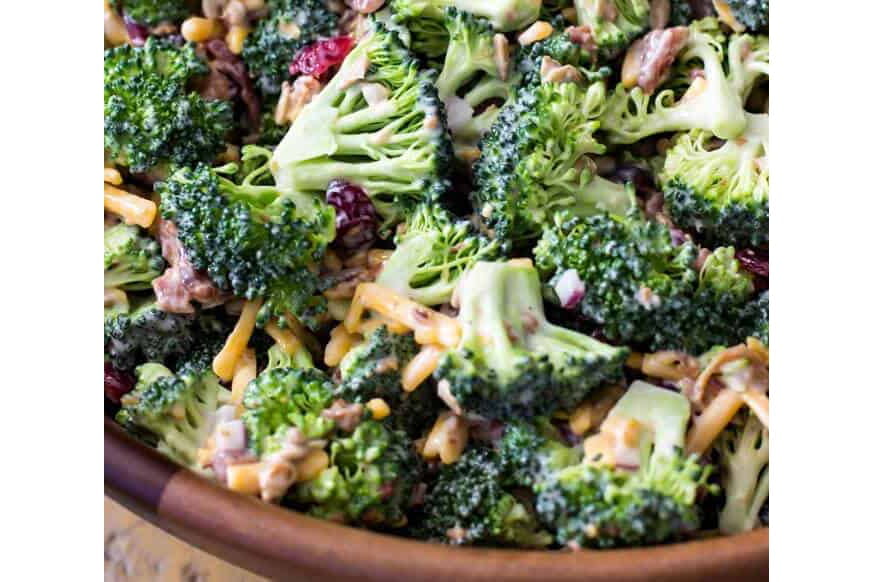 Broccoli salad with bacon, cranberries, sunflower seeds, cheddar cheese and a homemade dressing.