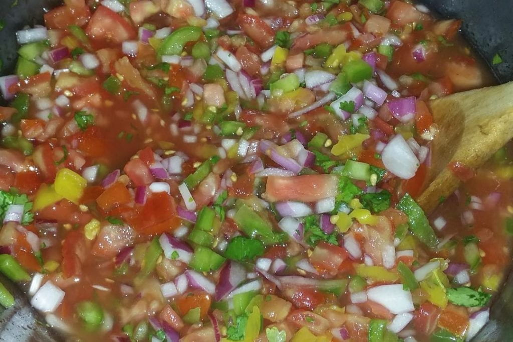 Salsa fresca with tomatoes, jalapenos, cilantro, onions.