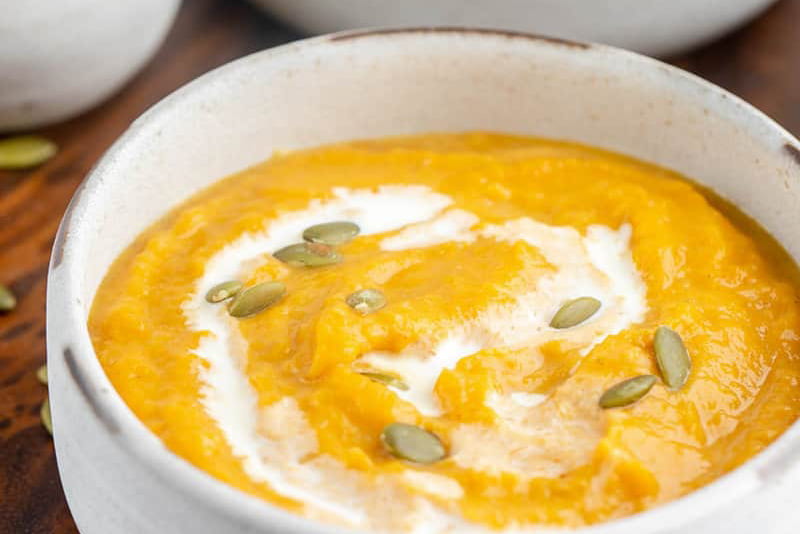 a bowl of copycat Panera autumn squash soup.